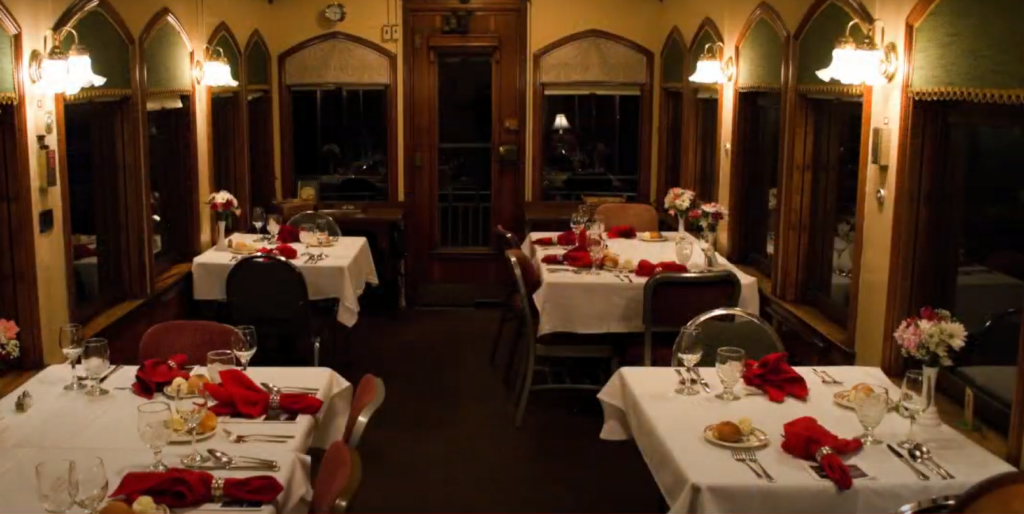 Several served tables on the special dinner train