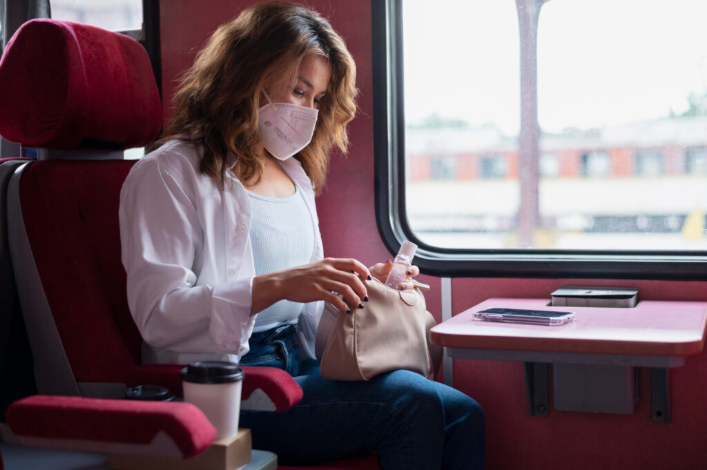 woman in pink bus